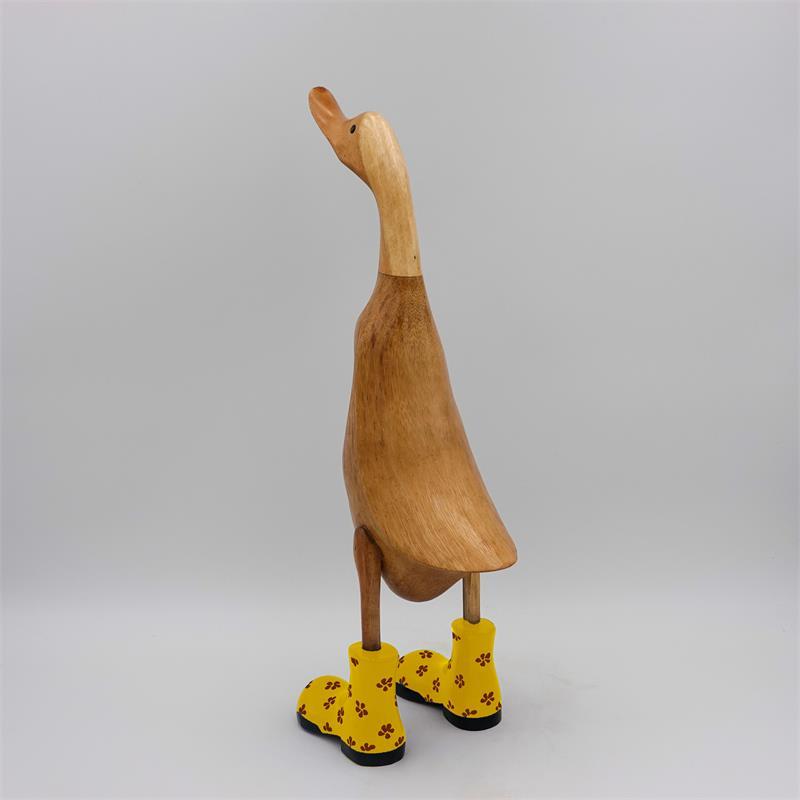 Canard « Dörte » grand brun dressé avec des chaussures à fleurs jaunes