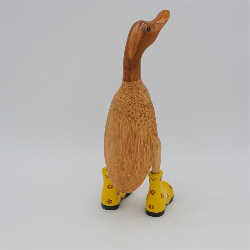 Canard »Daniela« brun moyen dressé avec des sabots fleuris jaunes