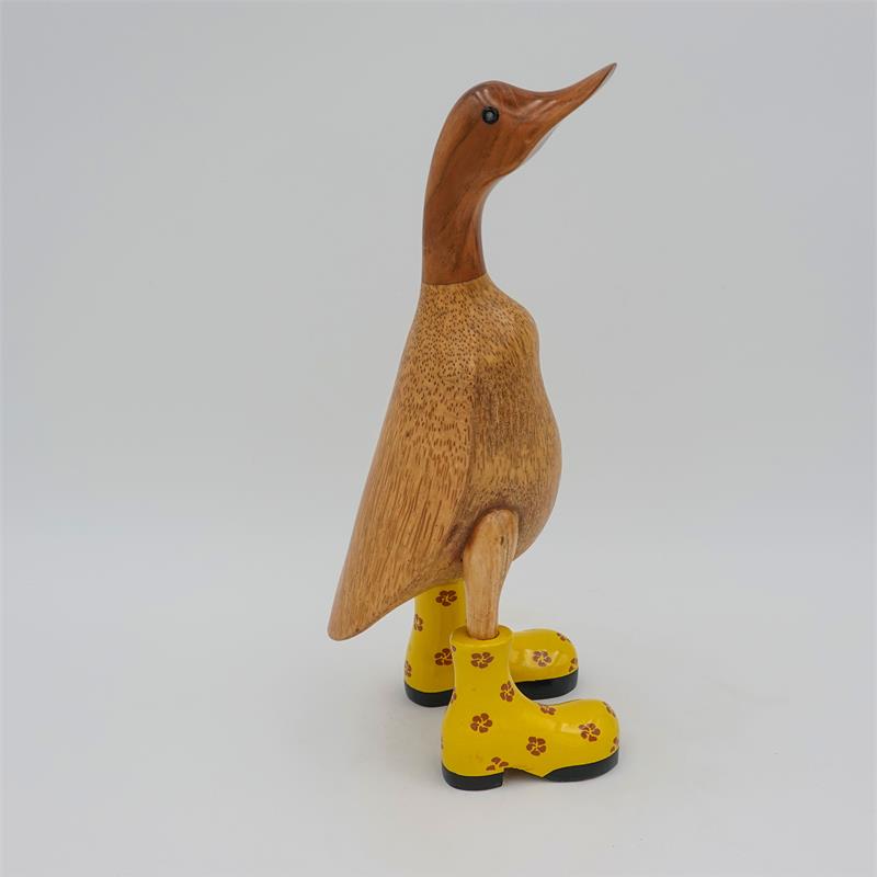 Canard »Daniela« brun moyen dressé avec des sabots fleuris jaunes