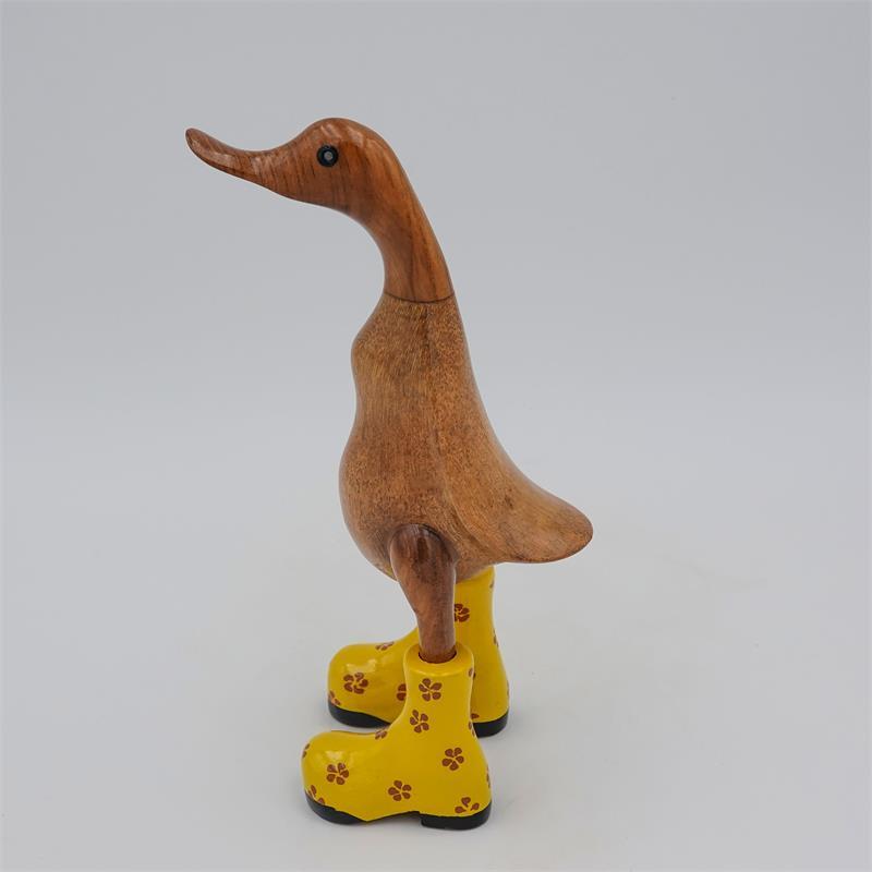 Canard »Dagmar« petit brun dressé avec des chaussures à fleurs jaunes