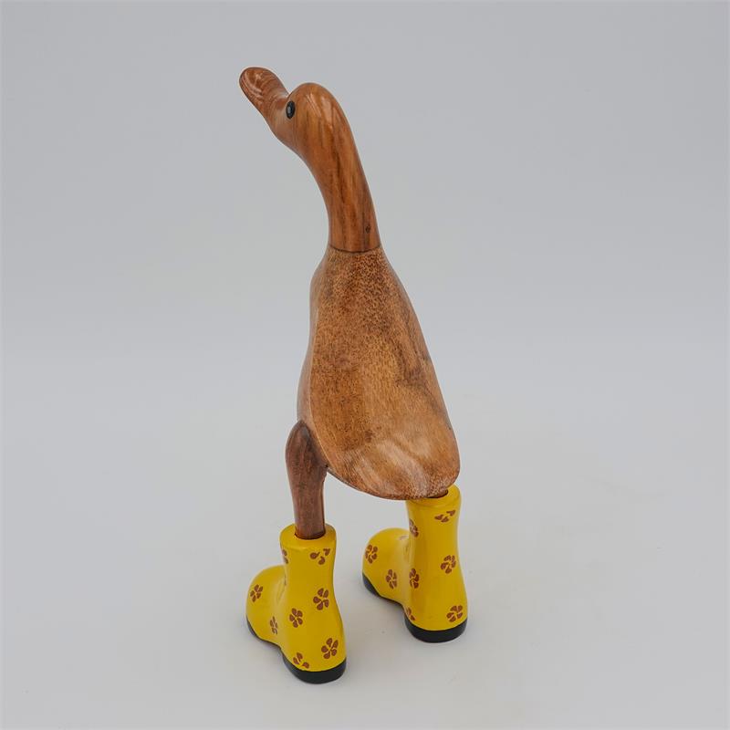 Canard »Dagmar« petit brun dressé avec des chaussures à fleurs jaunes