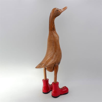Canard géant « Claudine » beige-brun dressé avec des chaussures rouges