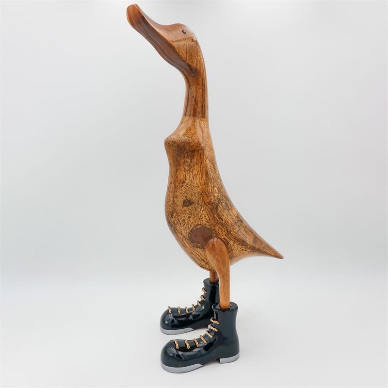 Canard géant « Wolfram » beige-brun dressé avec des chaussures noires/argentées