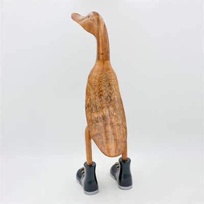 Canard géant « Wolfram » beige-brun dressé avec des chaussures noires/argentées