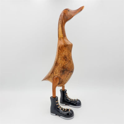Canard géant « Wolfram » beige-brun dressé avec des chaussures noires/argentées