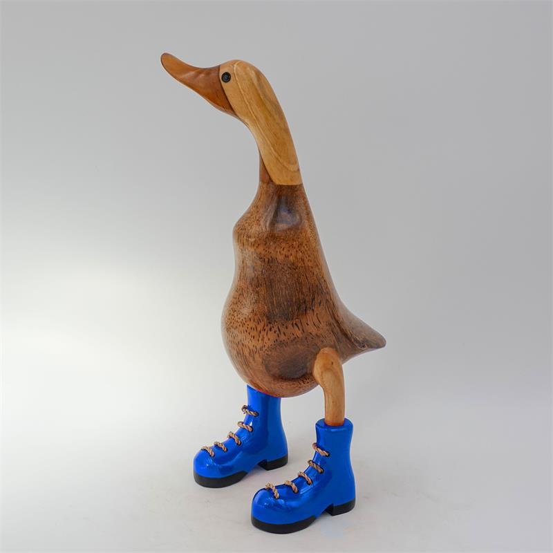 Canard »Klaas« brun moyen dressé avec des chaussures bleues