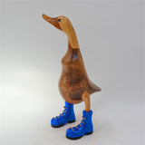 Canard »Klaas« brun moyen dressé avec des chaussures bleues