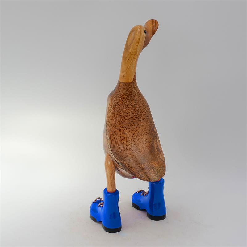 Canard »Klaas« brun moyen dressé avec des chaussures bleues