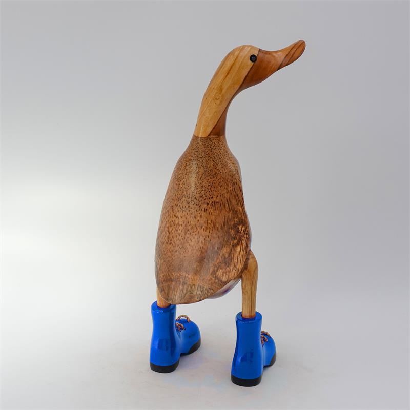Canard »Klaas« brun moyen dressé avec des chaussures bleues