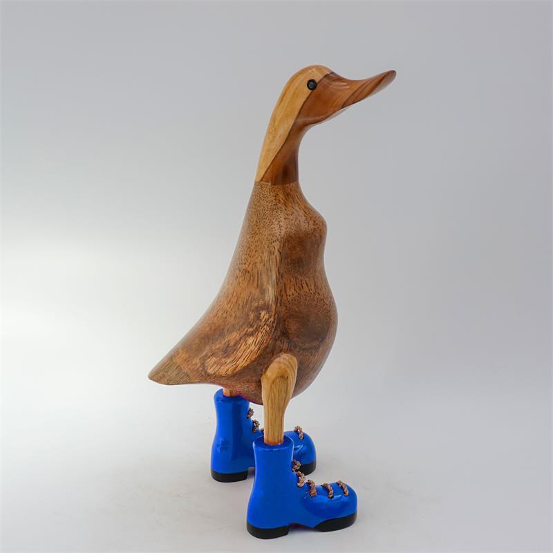Canard »Klaas« brun moyen dressé avec des chaussures bleues