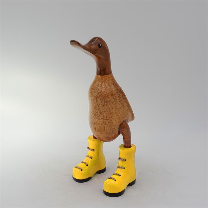 Canard »Jule« petit brun dressé avec des chaussures jaunes