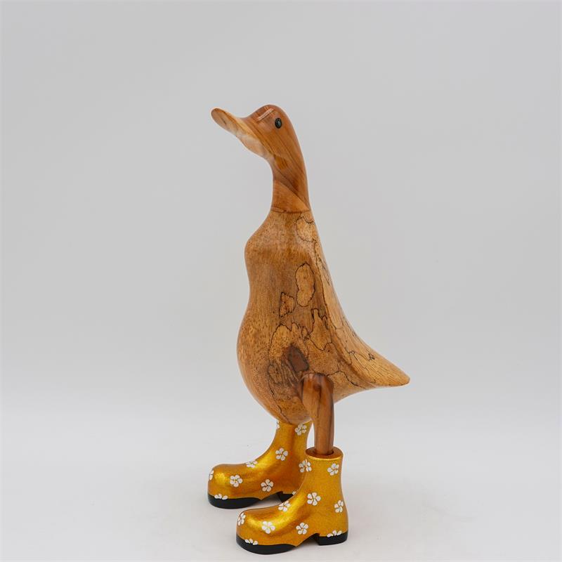 Canard » Bella « brun moyen dressé de couleur dorée avec des fleurs