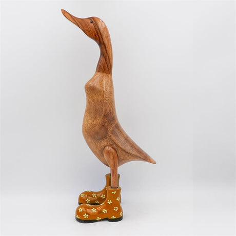Canard géant « Bertha » brun dressé de couleur dorée avec des fleurs