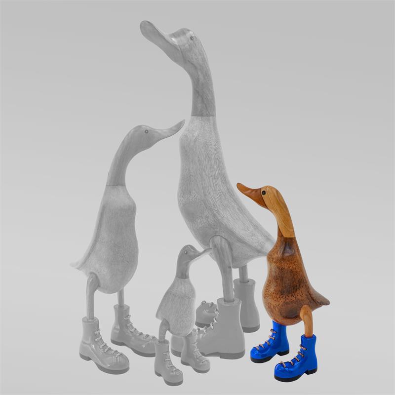 Canard »Klaas« brun moyen dressé avec des chaussures bleues